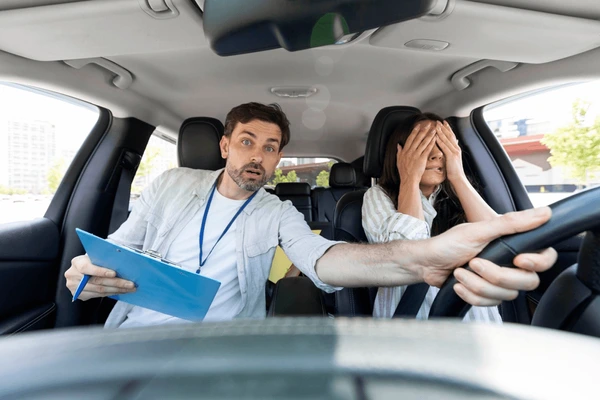 distressed-millennial-man-auto-instructor-600nw-2339703289
